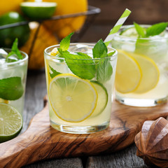 Lemonade. Drink with fresh lemon and lime. Cocktail with juice and ice.