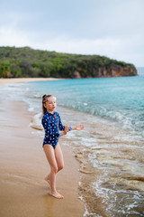 Adorable girl at beach