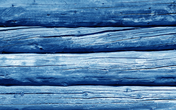 Old grunge wooden fence pattern in navy blue tone.