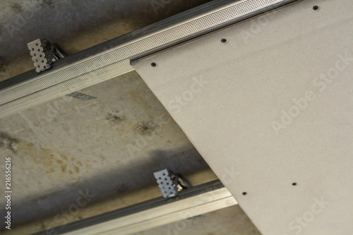 Close Up Detail Of Room Under Construction Suspended Ceiling From