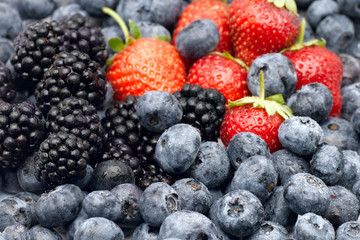 Closeup of fresh berries, blackberries, strawberries and blueberries.