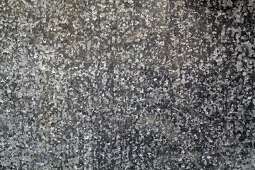 Metal plate surface.