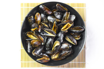 Delicious seafood steamed mussels on a plate