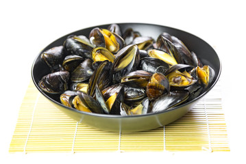 Delicious seafood steamed mussels on a plate