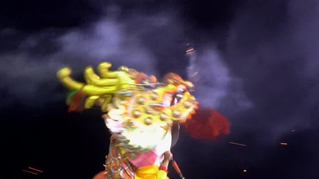 Chinese dragons performing at night.