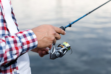 Fishing in the river at sunset.