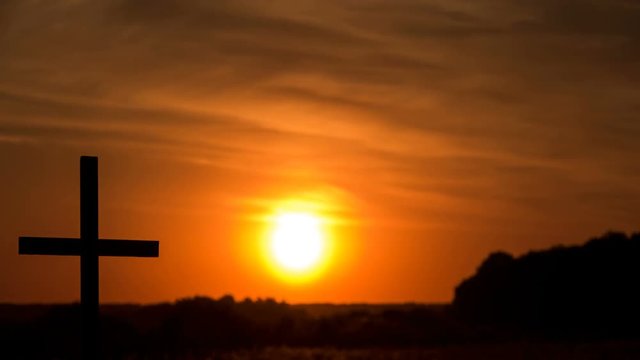 4К.Time-Lapse, Red sun, sunset  and  Christian Cross.