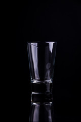 Empty glass on a black background