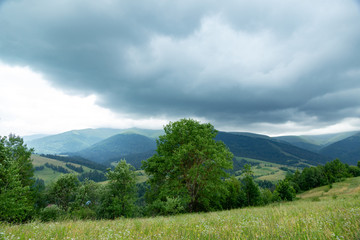 Mountain landscape with storm clouds