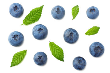 healthy background. blueberries with leaves isolated on white background. top view