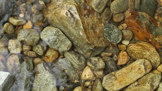 Small Rocks and Pebble Stones on a Creek Spring