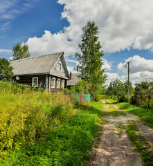 Old wooden log houses in the countryside.