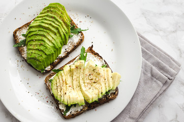 Avocado toasts on rye bread