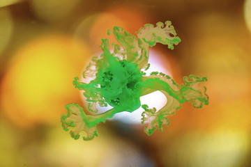 beautiful colorful jellyfish in the aquarium illuminated with neon lamp