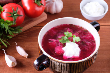 Traditional Ukrainian Russian borsch with sour cream