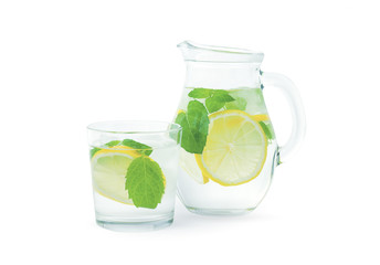 Lemonade with fresh lemon. Lemon water.