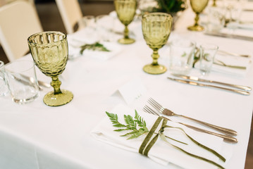 Delicate and stylish setting of the festive table. Banquet, wedding.