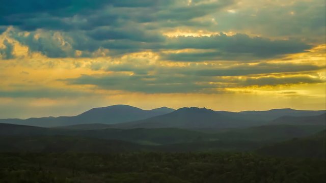 Time-lapse in the mountains with overcast weather