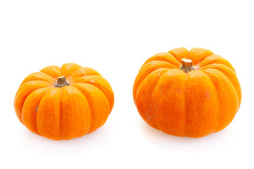 Two fall harvest of pumpkins isolated on white background