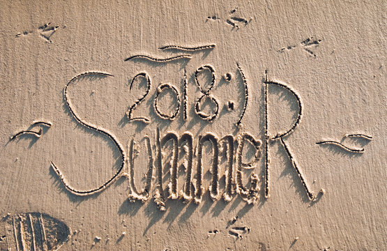 Summer 2018. Drawing on the sand. Card.
