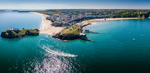 Aerial drone view of a picturesque and colorful coastal holiday town (Tenby, UK)