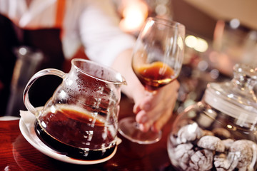 glassware for brewing and making coffee close-up against the background of a coffee house
