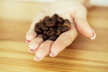 Good Morning. Coffee To Go. Coffee Beans on Wooden Table Backound
