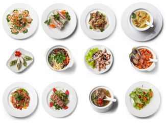 Rich collection of vietnamese dishes, view from above, isolated on white background