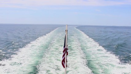 American Flag, wake from boat, Maine USA - Powered by Adobe