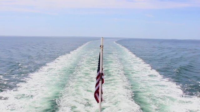 American Flag, wake from boat, Maine USA
