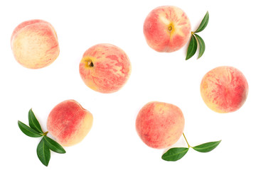 ripe peaches with leaves isolated on white background. Top view. Flat lay pattern