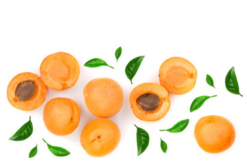 Apricot fruits with leaves isolated on white background with copy space for your text. Top view. Flat lay pattern