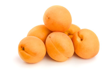 heap apricot fruits isolated on white background