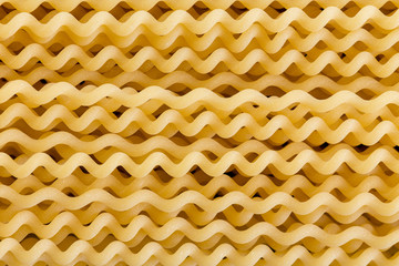 Background texture of spiral fusili Italian pasta