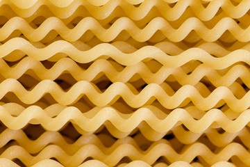 Close up of uncooked spiral fusili Italian pasta