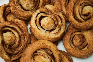 Cookies and sweet biscuits on white plate background, top view 