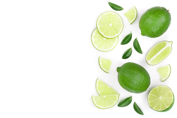 sliced lime vith leaves isolated on white background with copy space for your text. Top view. Flat lay pattern