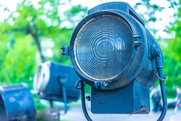 Fototapeta premium Retro lighting device. Cinema industry. Searchlight. Retro spotlight for shooting a movie.