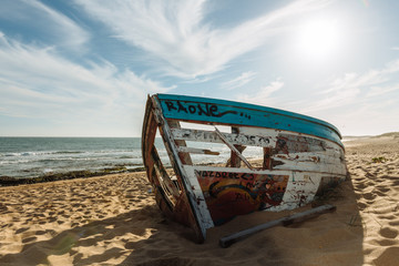 Wreck of a small boat in Trafalgar, Spain