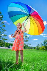 kid with colorful umbrella
