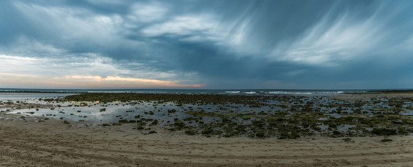 Storm coming after sunset in a beach in the south of Spain