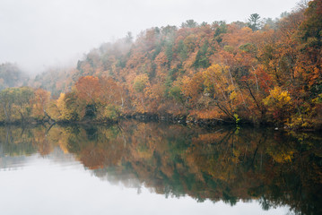 Fog and autumn color on the James River, from the Blue Ridge Parkway in Virginia.