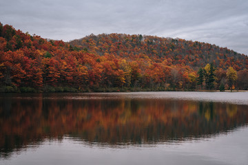 Autumn reflections at Sherando Lake, near the Blue Ridge Parkway in George Washington National Forest, Virginia.