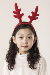 A asian girl hand hold a christmas gift on the white background.