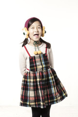 A asian girl portrait wearing winter clothes isolated white.