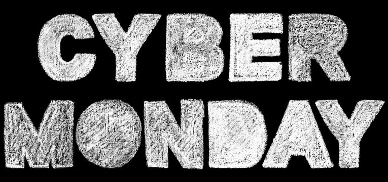 cyber monday bold text inscription lettering, handwritten white chalk letters isolated on black background, stock photo image