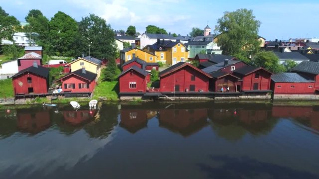 View on the old city barns on the banks of the river, July day. Porvoo, Finland