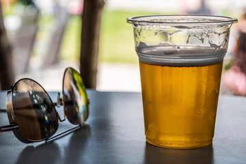 Sunglasses and beer