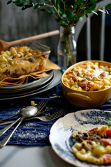 Baked rice with cheese on top.