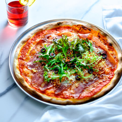 Pizza on Marble with drink